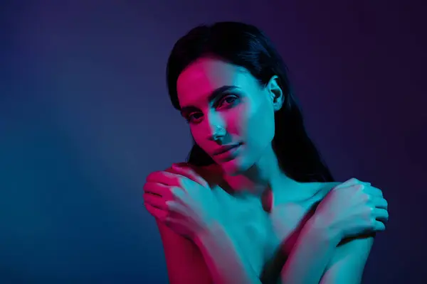 Photo Woman Embrace Herself Look Camera Isolated Neon Dark Violet — Stock Photo, Image