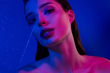 Photo of gentle dream lady enjoy hydration procedure in douche isolated on blue color background.