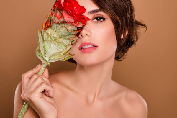 Photo of attractive girl hold cover flower face isolated pastel color background.