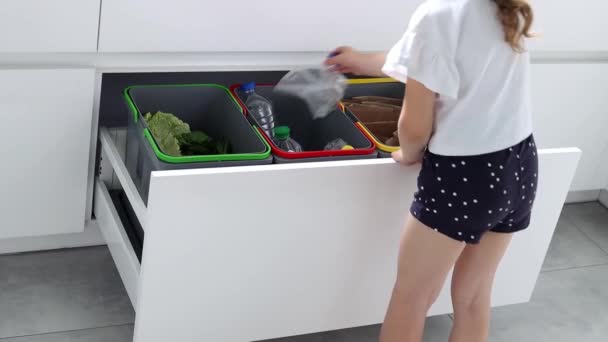 Small Child Sorts Garbage Containers Kitchen Slow Motion Modern Kitchen — Video Stock