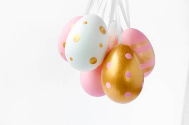Pastel Easter eggs isolated on white background. Happy Easter Greeting card with copy space for text. The minimal concept.