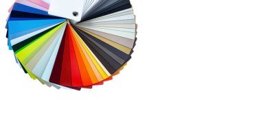 Banner of a color guide displaying a range of hues for use in interior design and decoration. Colorful color guide with a palette of paint samples on white background with copy space.