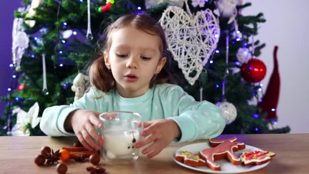Little Curly Girl Drinks Milk Glass Shape Bear Laughs Cheerfully — Stok video