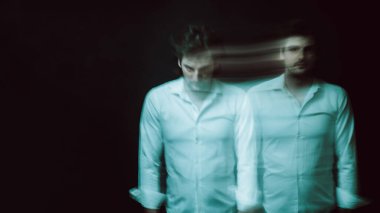 abstract blurry portrait of a man with mental and depressive illness with bipolar disorder