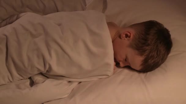 Small Child Boy Tosses Restlessly Sleep Pillow Blanket Night Sleeping — Stock Video