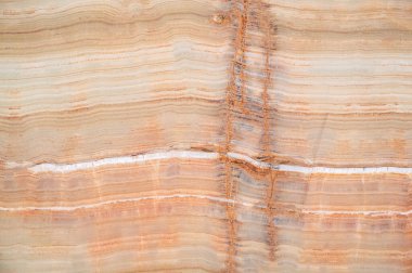 Sarı doğal mermer desenli.