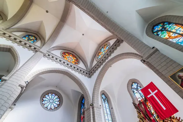 Stock image interior of a white Christian Catholic church. Cathedral of the Sacred Heart of Jesus. Tashkent, Uzbekistan - April 18, 2024