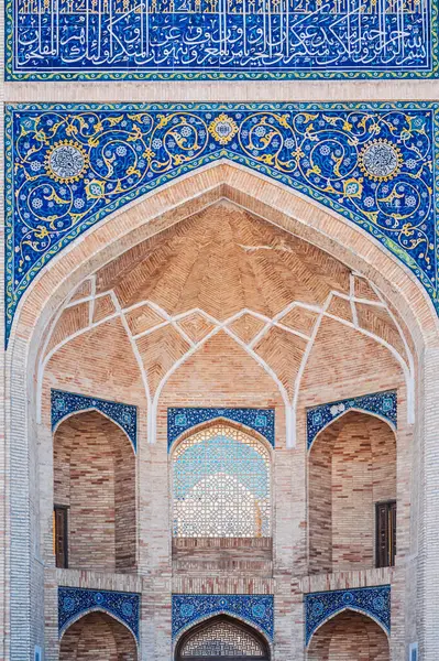 Stock image entrance portal of Barak Khan madrasah decorated with ancient ceramic tiles with traditional Uzbek ornaments with an Islamic pattern in Tashkent