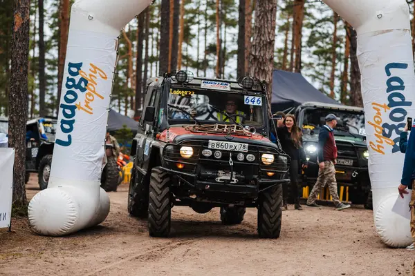 stock image REPUBLIC OF KARELIA, RUSSIA - CIRCA JUNE, 2022: Off-road tournament Ladoga Trophy 2022 around Lake Ladoga. 4x4 SUV UAZ at the grand start of the race