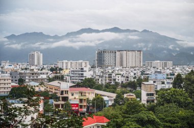 Panoramic view of Nha Trang city from above on a cloudy day in summer. Nha Trang, Vietnam - July 18, 2024 clipart