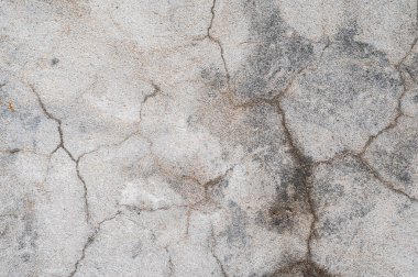 Çatlak, arka plan ve dokusu olan eski beton duvar.