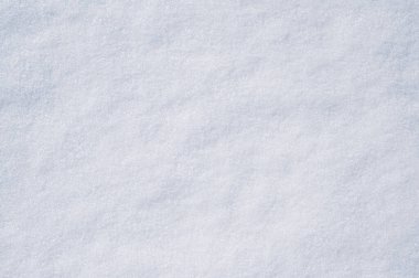 Karların doğal dokusu. Karla kaplı topraklar. Yukarıdan yakın çekim görüntüsü.