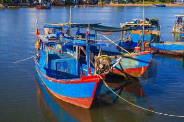 Local fishing harbor with boats in Nha Trang, Vietnam clipart