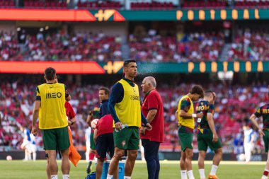 Cristiano Ronaldo, Portekiz ve Bosna-Hersek milli takımları arasında Estadio Da Luz, Lizbon, Portekiz 'de oynanan UEFA Euro 2024 ön eleme maçından önce ısınıyor. (Maciej Rogowski)