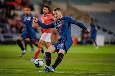 UEFA Euro 2024 eleme maçı sırasında, Gibraltar ve Hollanda, Estadio Algarve, Loule, Faro, Portekiz milli takımları arasında oynanan Teun Koopmeiners maçı. (Maciej Rogowski)