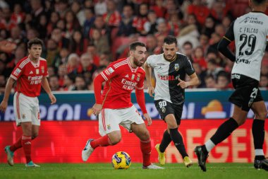 Portekiz 'in Lizbon şehrindeki Estadio Da Luz' da oynayan SL Benfica ile SC Farense arasında oynanan Liga Portekiz maçında Orkun Kokcu. (Maciej Rogowski)