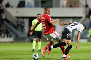 Artur Cabral, Claudio Falcao Liga Portekiz maçı sırasında SC Farense ve SL Benfica, Estadio de Sao Luis, Faro, Portekiz arasında oynadı. (Maciej Rogowski)