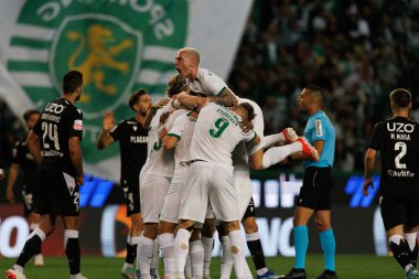 Spor Oyuncuları, Portekiz 'in Lizbon şehrindeki Estadio Jose Alvalade' de oynanan Liga CP ve Vitoria SC maçlarını kutluyor. (Maciej Rogowski)
