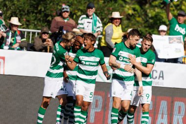 Portekiz 'in başkenti Lizbon' da bulunan Estadio Nacional Jamor 'da FC Porto ve Sporting CP arasında oynanan Taca de Portugal 2024 final maçında Jeremiah St. Juste' nin attığı gol sonrasında Sporting oyuncuları bunu kutluyor. (Maciej Rogowski)