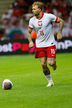 Polonya ve Ukrayna milli takımları arasında PGE Narodowy, Varşova, Polonya 'da oynanan dostça maç sırasında Tymoteusz Puchacz 