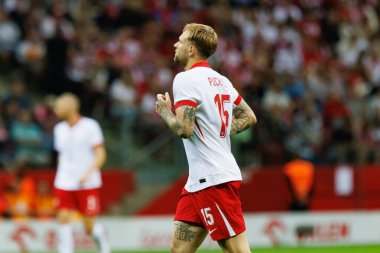 Polonya ve Ukrayna milli takımları arasında PGE Narodowy, Varşova, Polonya 'da oynanan dostça maç sırasında Tymoteusz Puchacz 