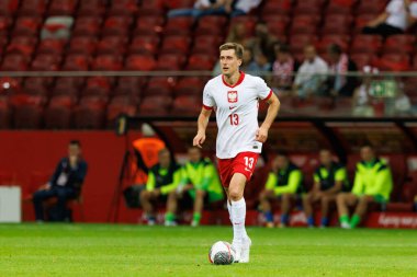 Polonya ve Ukrayna milli takımları arasında PGE Narodowy, Varşova, Polonya 'da oynanan dostça maç sırasında Taras Romanczuk 