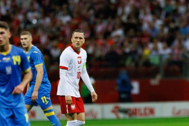 Polonya ve Ukrayna milli takımları arasında PGE Narodowy, Varşova, Polonya 'da oynanan dostça maç sırasında Piotr Zielinski 