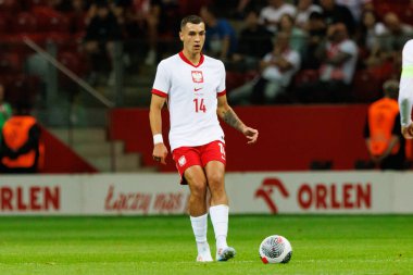 Polonya ve Ukrayna milli takımları arasında PGE Narodowy, Varşova, Polonya 'da oynanan dostça maç sırasında Jakub Kiwior 