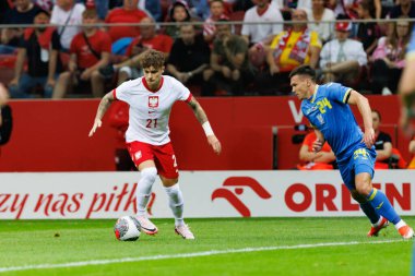 Polonya ve Ukrayna milli takımları arasında oynanan PGE Narodowy, Varşova, Polonya 'da oynanan dostça maç sırasında Nicola Zalewski 