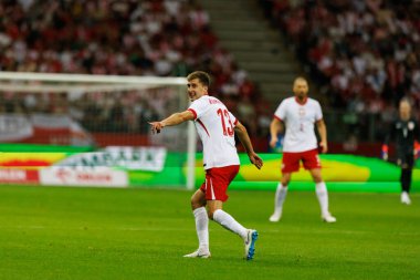 Polonya ve Ukrayna milli takımları arasında PGE Narodowy, Varşova, Polonya 'da oynanan dostça maç sırasında Taras Romanczuk 