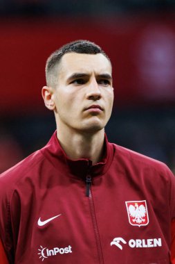 Polonya ve Ukrayna milli takımları arasında PGE Narodowy, Varşova, Polonya 'da oynanan dostça maç sırasında Jakub Kiwior 