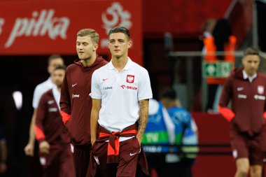 Polonya ve Ukrayna milli takımları arasında PGE Narodowy, Varşova, Polonya 'da oynanan dostça maç sırasında Kacper Urbanski 