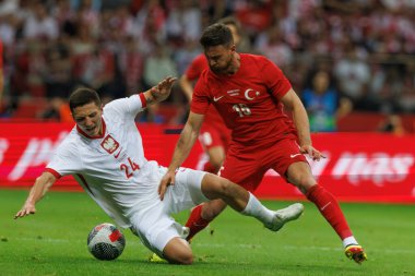Polonya ve Türkiye milli takımları arasında oynanan PGE Narodowy, Varşova, Polonya (Maciej Rogowski) maçında Bartosz Slisz, Salih Özcan)