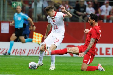 Polonya ve Türkiye milli takımları arasındaki PGE Narodowy, Varşova, Polonya (Maciej Rogowski) dostluk maçı sırasında Krzysztof Piatek, Samet Akaydin)