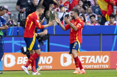 İspanya 'nın oyuncuları, İspanya ve Hırvatistan milli takımları arasında oynanan UEFA Euro 2024 maçında Dani Carvajal' ın attığı gol sonrasında Olympiastadion, Berlin, Almanya 'da (Maciej Rogowski)