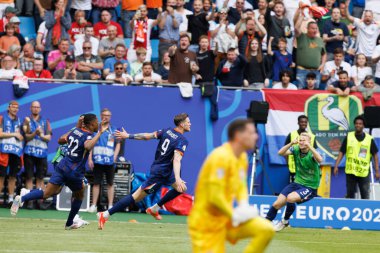 Wout Weghorst ve Hollanda takımı, Polonya ve Hollanda milli takımları arasında oynanan UEFA Euro 2024 maçında attıkları golü Berlin, Almanya 'da Olimpiyat Stadyumu' nda kutladılar (Maciej Rogowski))