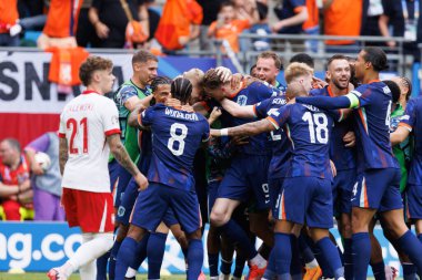 Wout Weghorst ve Hollanda takımı, Polonya ve Hollanda milli takımları arasında oynanan UEFA Euro 2024 maçında attıkları golü Berlin, Almanya 'da Olimpiyat Stadyumu' nda kutladılar (Maciej Rogowski))