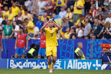 Denis Dragus, UEFA Euro 2024 maçında İtalya 'nın Allianz Arena kentinde Romanya ve Ukrayna milli takımları arasında attığı golü kutluyor (Maciej Rogowski))