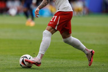 Nicola Zalewski, Polonya ve Hollanda milli takımları arasında oynanan UEFA Euro 2024 maçında Nike ayakkabılarıyla Olympiastadion, Berlin, Almanya (Maciej Rogowski))