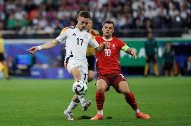 Florian Wirtz, Granit Xhaka, İsviçre ve Almanya milli takımları arasında Almanya 'nın Frankfurt kentinde oynanan maçta görüldü (Maciej Rogowski)