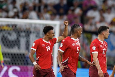 Ivan Ndoye, İsviçre ve Almanya milli takımları arasında oynanan UEFA Euro 2024 maçında Almanya 'nın Frankfurt kentinde oynanan Deutsche Bank Park' ta gol attıktan sonra kutlama yaparken görüldü (Maciej Rogowski))