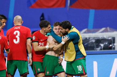 Portekizli oyuncular, Portekiz ve Çek Cumhuriyeti milli takımları arasında oynanan UEFA Euro 2024 maçında Francisco Conceicao 'dan gol üstüne gol atarken Red Bull Arena' da (Maciej Rogowski)