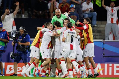 Gürcistan 'ın oyuncuları, Almanya' nın Köln kentinde oynanan RheinEnergieStadion 'da İspanya ve Gürcistan milli takımları arasında oynanan 16 maçlık UEFA Euro 2024 turunda attıkları golün ardından kutlama yaparken görüldü (Maciej Rogowski))