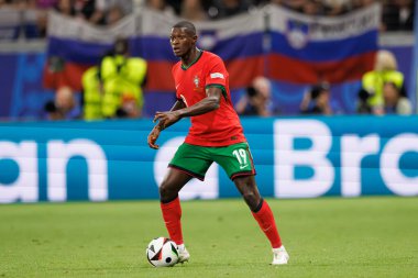 Nuno Mendes, Portekiz ve Slovenya milli takımları arasında Almanya 'nın Deutsche Bank Park kentinde oynanan 16 maçlık UEFA Euro 2024 raundunda görüldü (Maciej Rogowski)