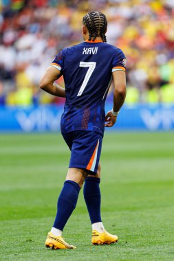 Xavi Simons, Romanya ve Hollanda milli takımları arasında Almanya 'nın Allianz Arena kentinde oynanan 16 maçlık UEFA Euro 2024 raundunda görüldü (Maciej Rogowski)