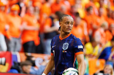 Xavi Simons, Romanya ve Hollanda milli takımları arasında Almanya 'nın Allianz Arena kentinde oynanan 16 maçlık UEFA Euro 2024 raundunda görüldü (Maciej Rogowski)