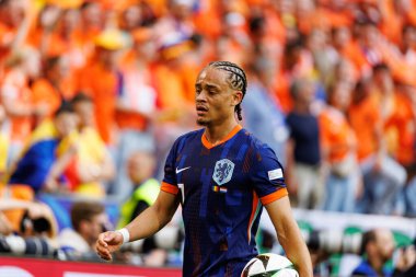Xavi Simons, Romanya ve Hollanda milli takımları arasında Almanya 'nın Allianz Arena kentinde oynanan 16 maçlık UEFA Euro 2024 raundunda görüldü (Maciej Rogowski)