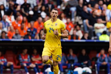 Bogdan Racovitan, Romanya ve Hollanda milli takımları arasında Almanya 'nın başkenti Allianz Arena' da oynanan 16 maçlık UEFA Euro 2024 raundunda görüldü (Maciej Rogowski)