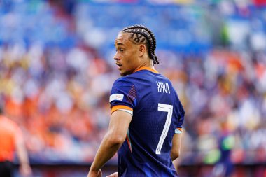 Xavi Simons, Romanya ve Hollanda milli takımları arasında Almanya 'nın Allianz Arena kentinde oynanan 16 maçlık UEFA Euro 2024 raundunda görüldü (Maciej Rogowski)