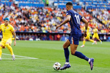 Cody Gakpo, Romanya ve Hollanda milli takımları arasında Almanya 'nın Allianz Arena kentinde oynanan 16 maçlık UEFA Euro 2024 raundunda görüldü (Maciej Rogowski)